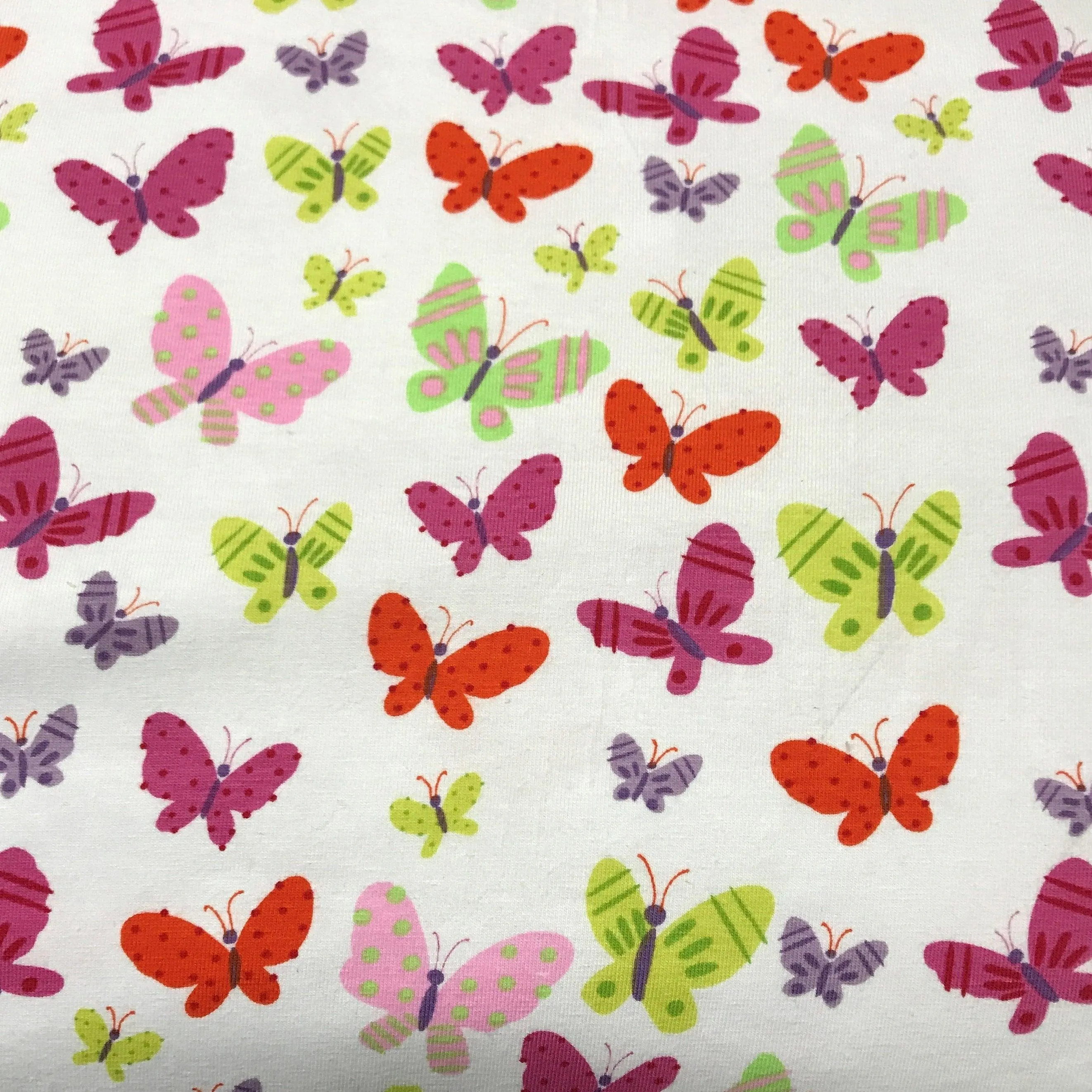 Butterflies on White Cotton/Spandex Jersey Fabric